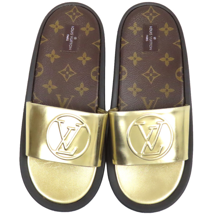 LOUIS VUITTON  
LV Circle Mule Slide Metallic Leather  
Sunburst Line Sandals  
Monogram