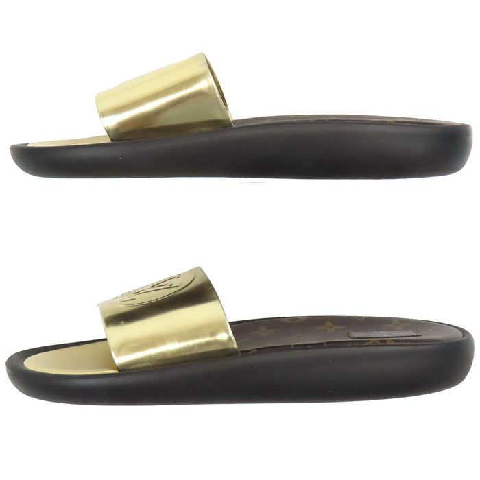 LOUIS VUITTON
Ciabatte a fascia LV Circle in pelle metallizzata
Sandali linea Sunburst
Monogramma