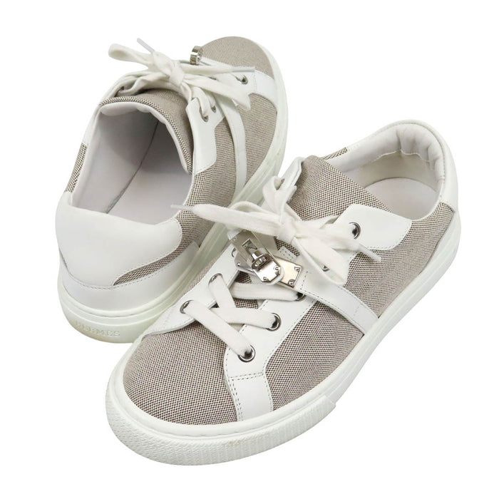 HERMES  
Logo Kelly Hardware Leather Low-Cut  
Day Canvas Sneakers