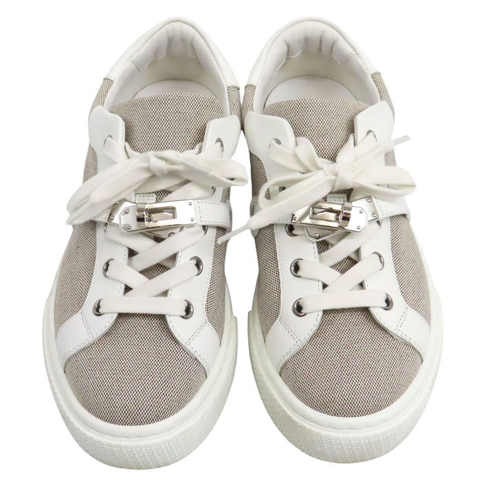 HERMES  
Logo Kelly Hardware Leather Low-Cut  
Day Canvas Sneakers