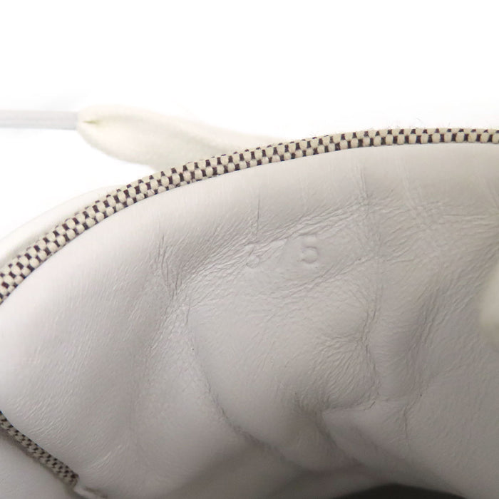 HERMES  
Logo Kelly Hardware Leather Low-Cut  
Day Canvas Sneakers