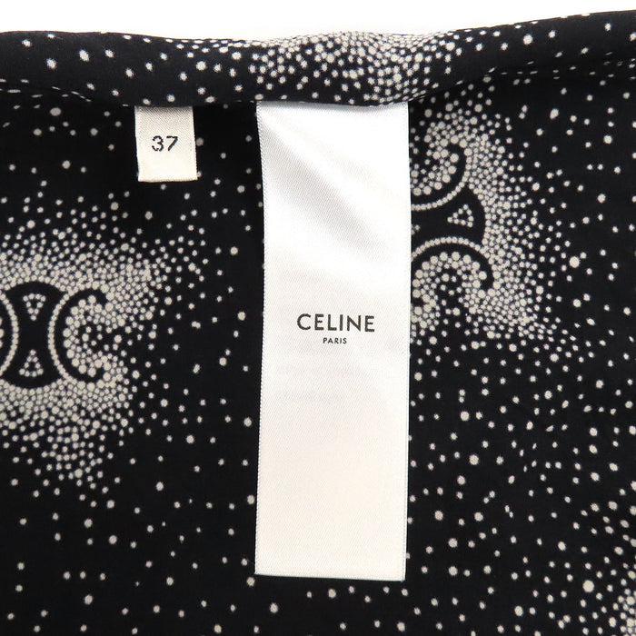 CELINE
Camicia a maniche corte in seta con colletto aperto e motivo logo all-over
Camicia a maniche corte in seta con motivo Triomphe all-over