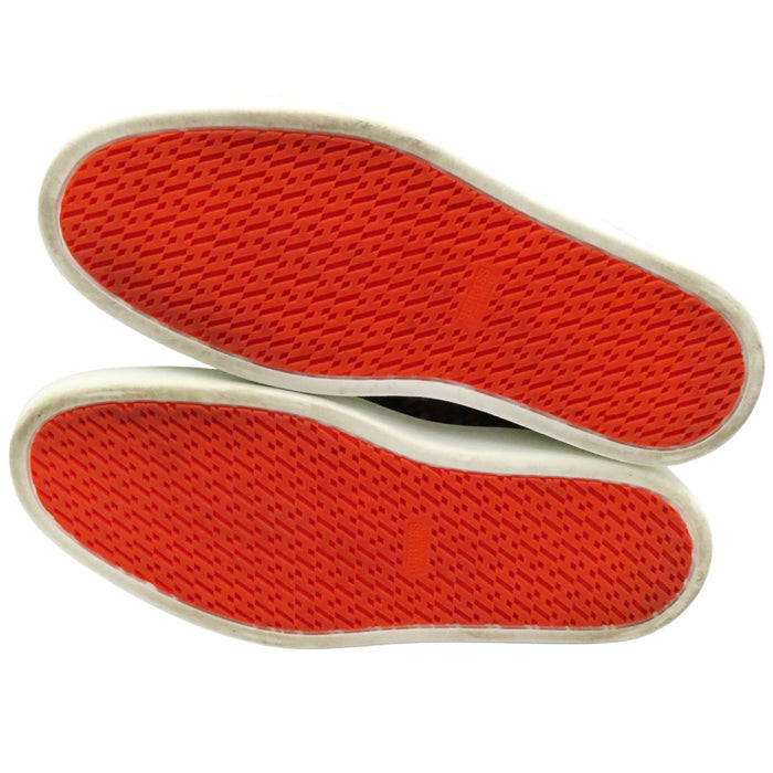HERMES
Sneaker basse in pelle con lacci, motivo a logo H e stampa all-over, tela free