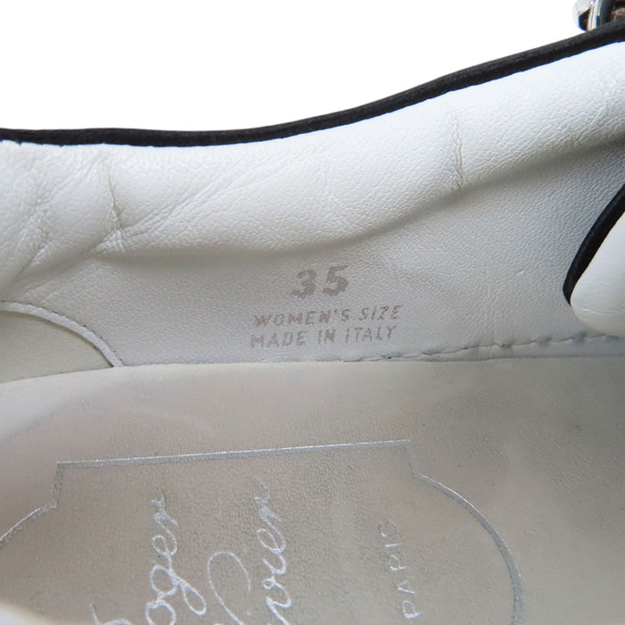 ROGER VIVIER  
Sneaker basse in raso con fibbia strass e bijoux