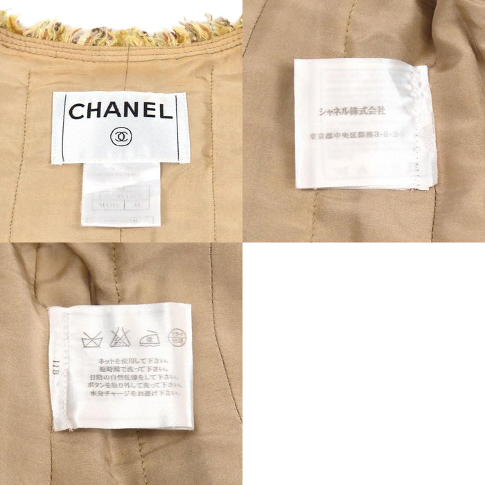 CHANEL  
COCO CC Coco Button Fringe 06P  
Coco Mark Tweed Collarless Jacket