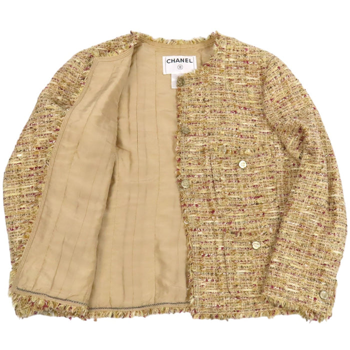 CHANEL  
COCO CC Coco Button Fringe 06P  
Coco Mark Tweed Collarless Jacket