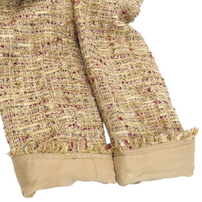 CHANEL  
COCO CC Coco Button Fringe 06P  
Coco Mark Tweed Collarless Jacket