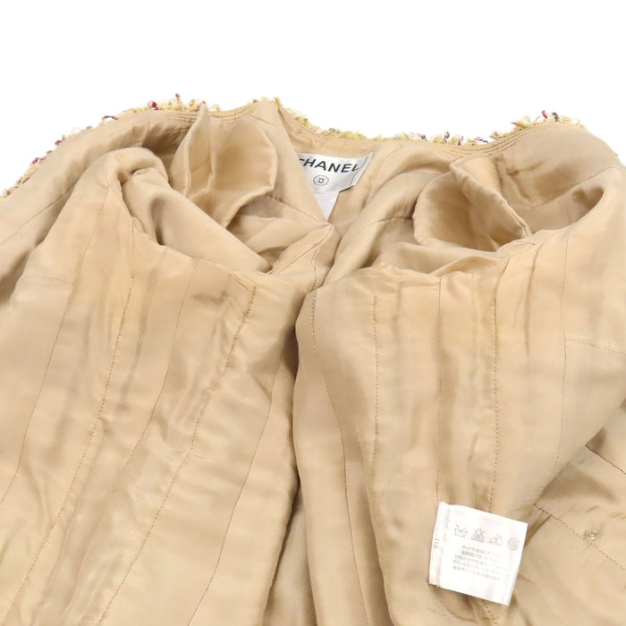 CHANEL  
COCO CC Coco Button Fringe 06P  
Coco Mark Tweed Collarless Jacket
