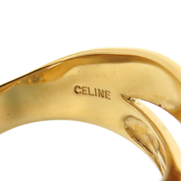 CELINE 
Bague croix logo diamant