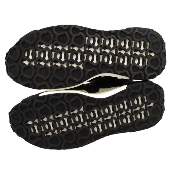 MONCLER 
Baskets dad sneakers tricolores métalliques à lacets 
COMPASSOR