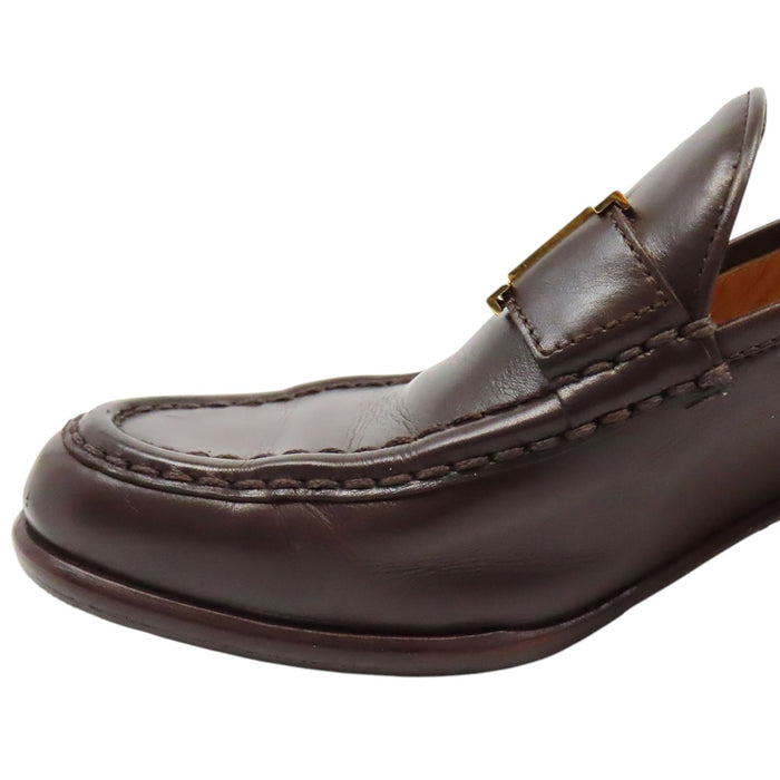 HERMES 
Mocassins à talon Constance en cuir avec logo H Ash et ferrures dorées