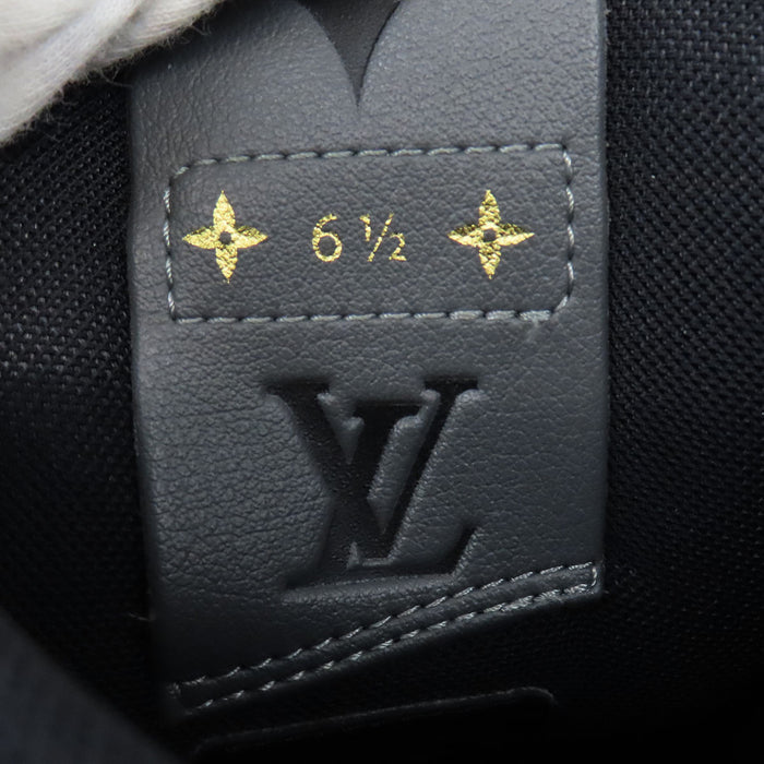 LOUIS VUITTON 
Baskets montantes à motif intégral en denim et cuir avec logo LV Charlie Line 
Monogramme