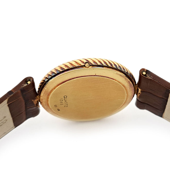 OMEGA 
Vintage Round