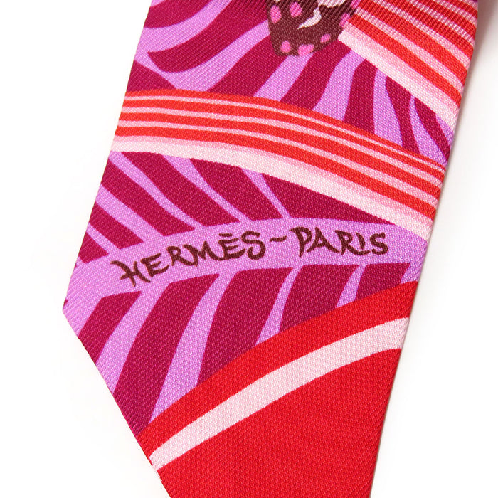 HERMES 
Foulard Twilly en soie avec logo Jaguar Quetzal