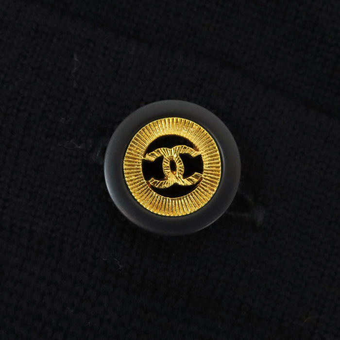 CHANEL 
Bouton Coco CC vintage laine 30870 
Robe tricotée logo Coco