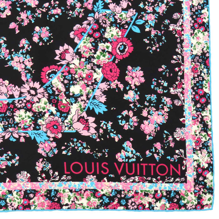 LOUIS VUITTON  
Écharpe en soie grande taille LV fleur  
Écharpe motif logo floral
