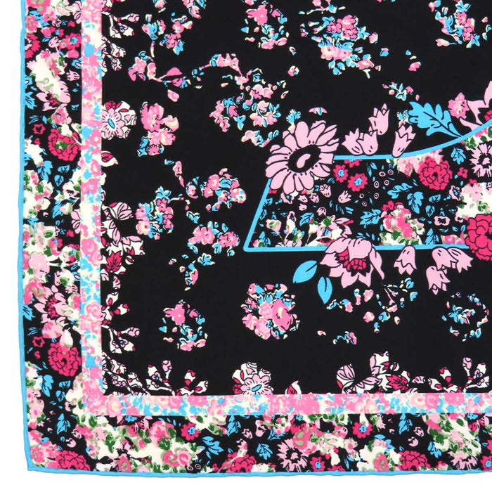 LOUIS VUITTON  
Écharpe en soie grande taille LV fleur  
Écharpe motif logo floral