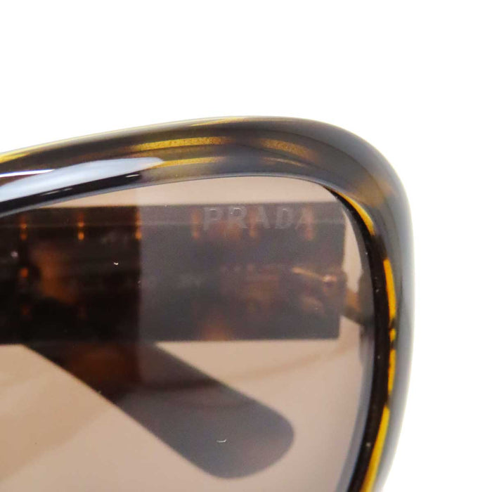 PRADA 
ロゴ べっ甲柄 
スタッズ オーバーサイズ サングラス