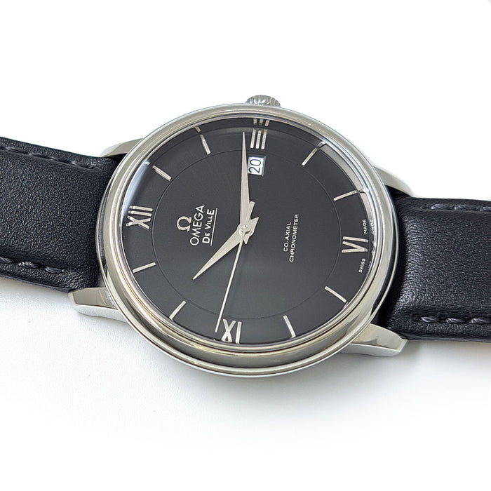 OMEGA  
De Ville Prestige Co-Axial  
With box and warranty card