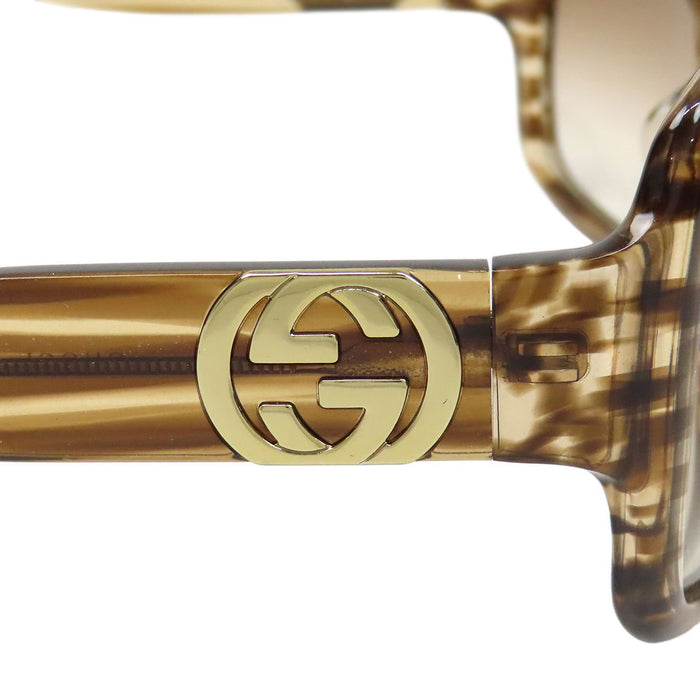 GUCCI  
Logo Eyewear  
Interlocking G Glitter Sunglasses