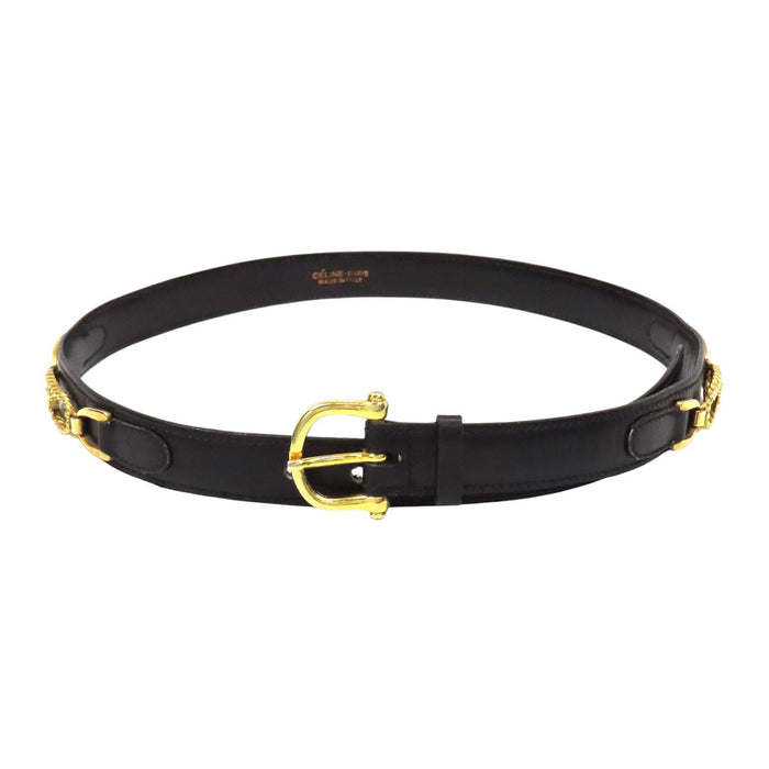 CELINE  
Logo vintage gold-colored hardware  
Macadam leather belt