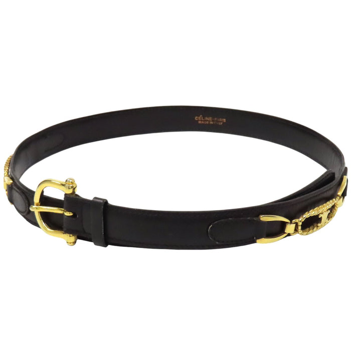 CELINE  
Logo vintage gold-colored hardware  
Macadam leather belt