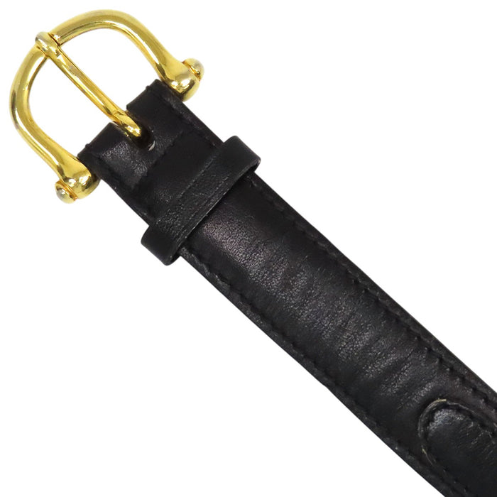 CELINE  
Logo vintage gold-colored hardware  
Macadam leather belt