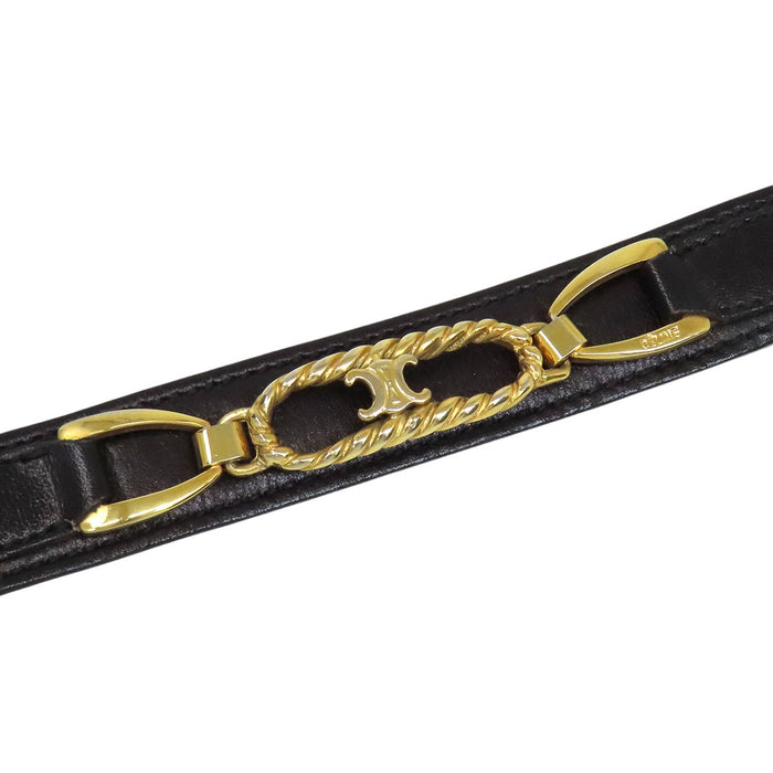CELINE  
Logo vintage gold-colored hardware  
Macadam leather belt