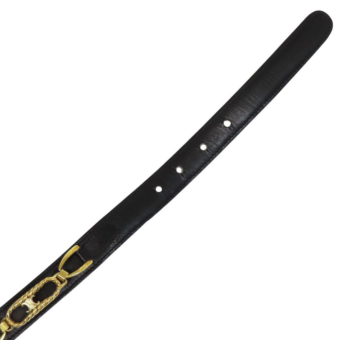 CELINE  
Logo vintage gold-colored hardware  
Macadam leather belt