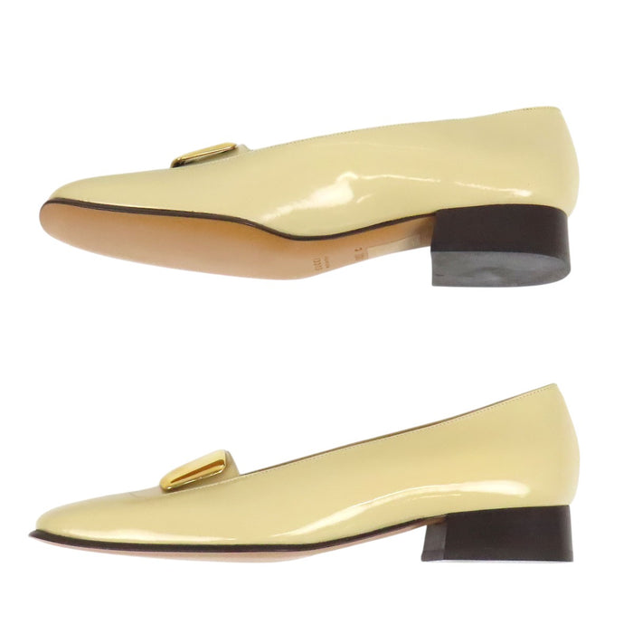 GUCCI 
Leather gold-colored metal square toe 
G logo patent pumps