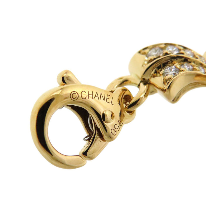 CHANEL  
Comet Shooting Star Swing Heart Charm