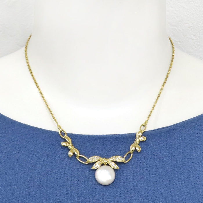 MIKIMOTO  
Mabe Pearl Ribbon Motif Necklace
