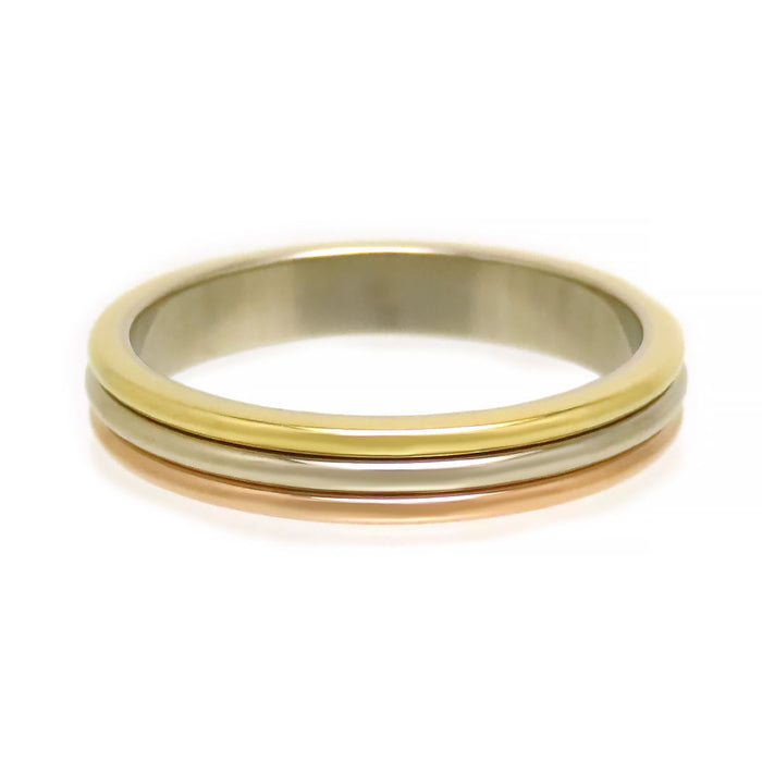 CARTIER  
Anello nuziale in tre ori