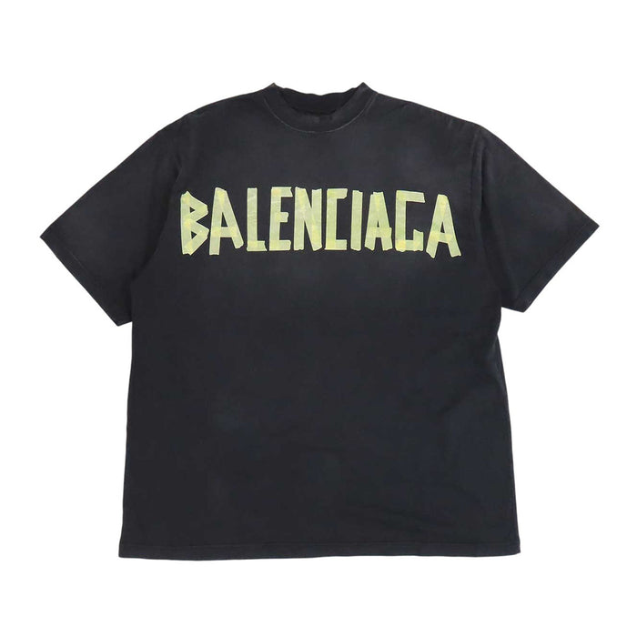 BALENCIAGA  
T-shirt oversize in cotone con effetto sbiadito e strappi, logo a nastro