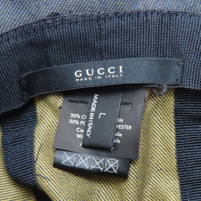 GUCCI
Cappello a secchiello in tela GG con rifiniture in pelle e logo