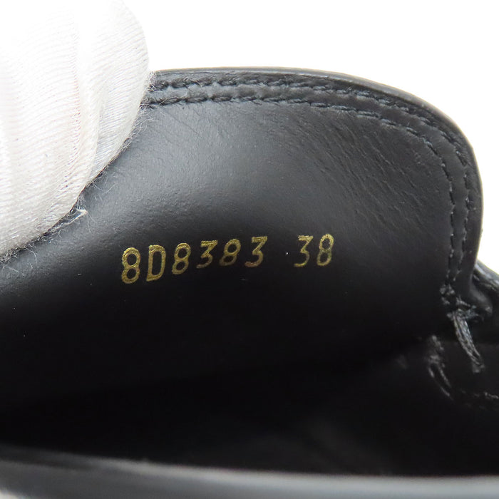 FENDI  
Logo leather gold-colored metal  
Graffiti loafers
