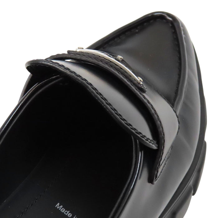 PRADA  
Triangle Logo Pointed Toe  
Monolith Brushed Leather Loafers