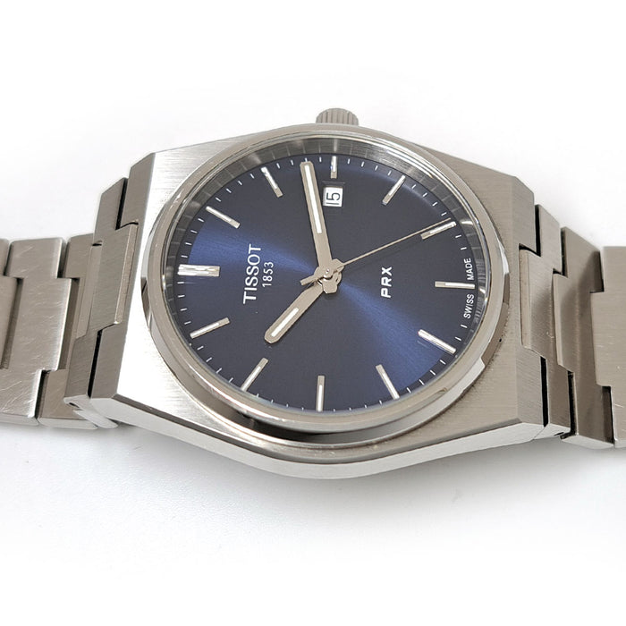 TISSOT 
PRX 
With box and warranty