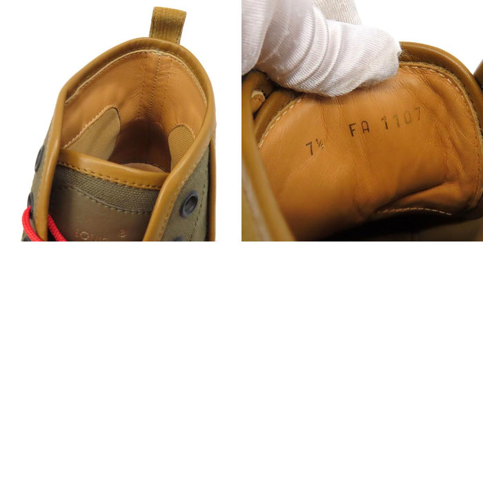 LOUIS VUITTON  
Baskets montantes en cuir et toile avec logo LV  
Monogramme Éclipse