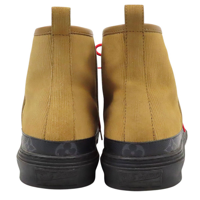 LOUIS VUITTON  
Baskets montantes en cuir et toile avec logo LV  
Monogramme Éclipse