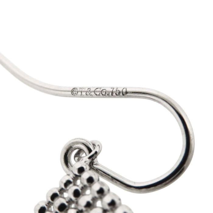 TIFFANY & Co.  
Cut Ball Earrings Single Piece
