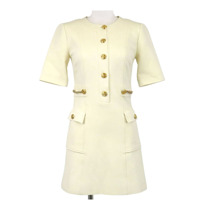 GUCCI  
Chain button with gold-colored hardware  
Double G short-sleeve dress