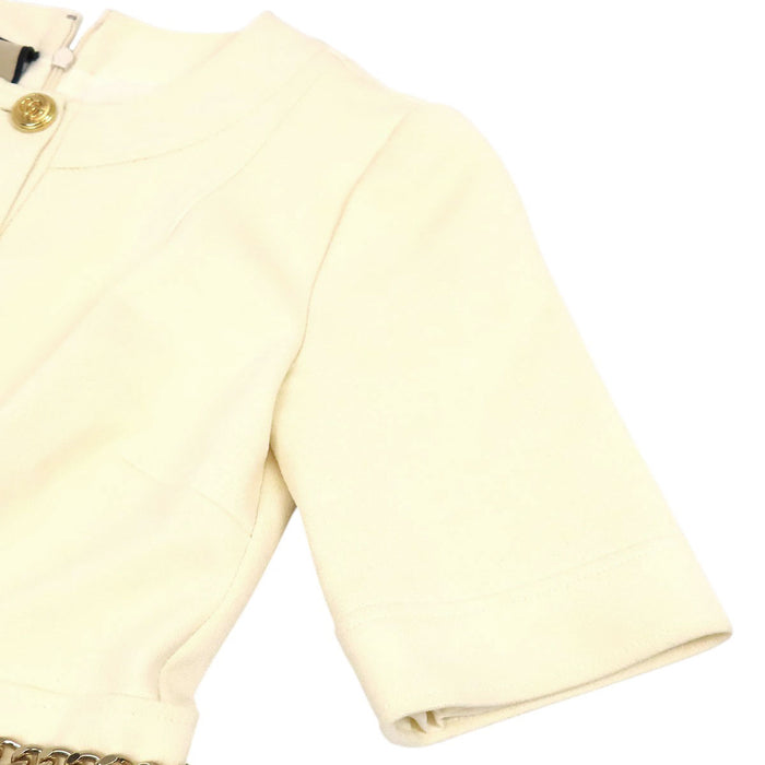 GUCCI  
Chain button with gold-colored hardware  
Double G short-sleeve dress