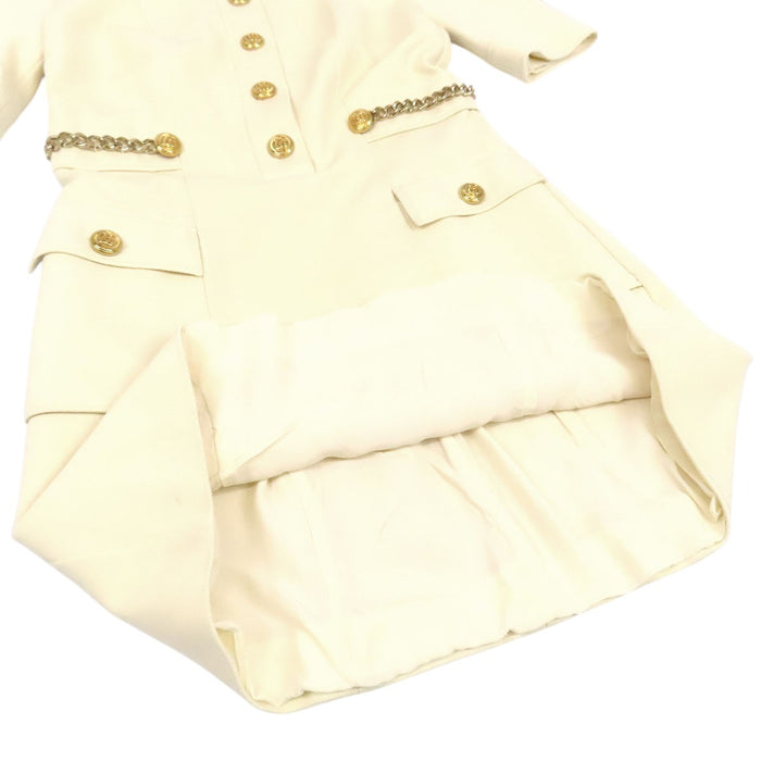 GUCCI  
Chain button with gold-colored hardware  
Double G short-sleeve dress