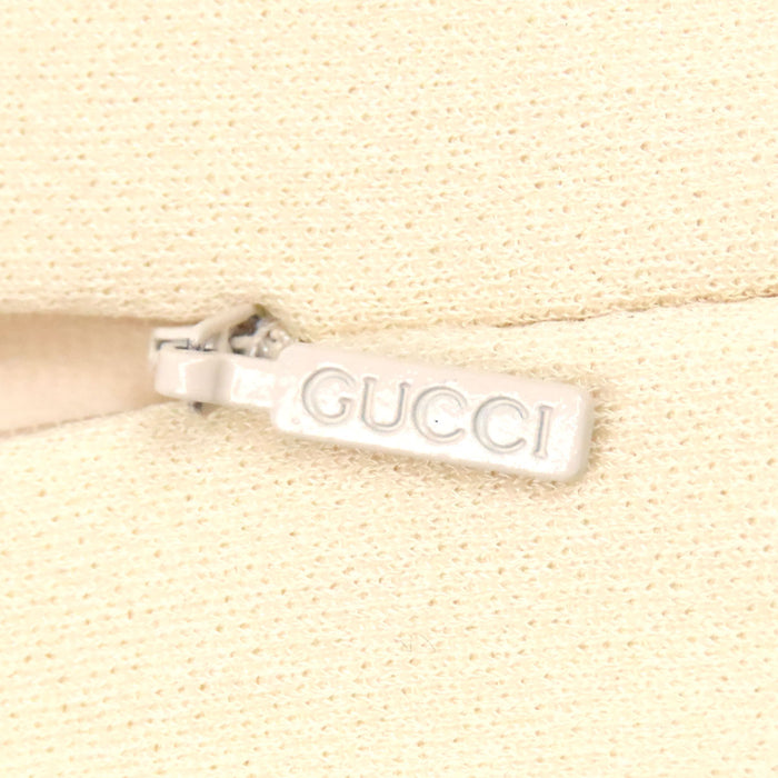 GUCCI  
Chain button with gold-colored hardware  
Double G short-sleeve dress