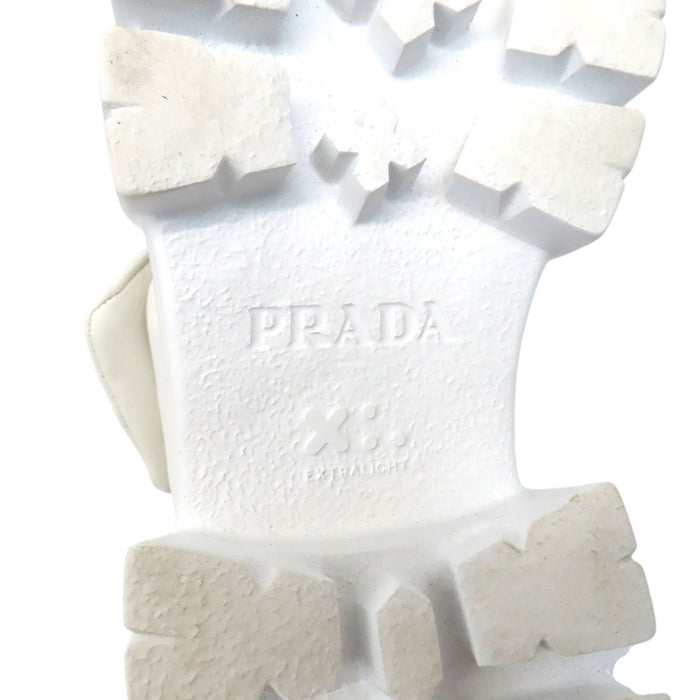PRADA  
Triangle Logo Platform Silver Color Hardware  
Monolith Padded Leather Sandals