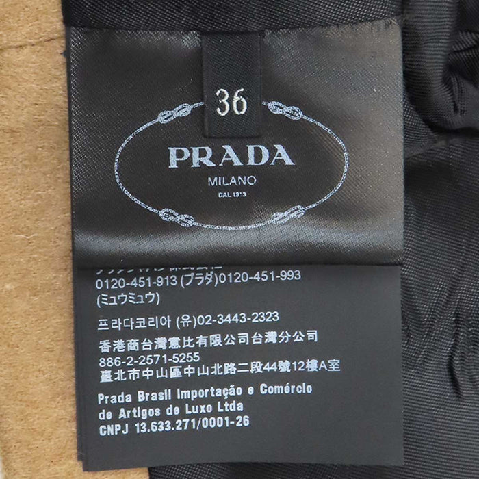 PRADA 
三角プレート ショート丈 ジップアップ 
トライアングルロゴ キャメル ブルゾン