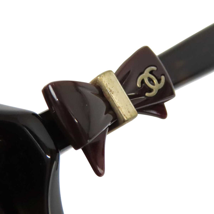 CHANEL 
COCO CC ロゴ ゴールドカラーメタル アイウェア 
ココマーク リボン サングラス