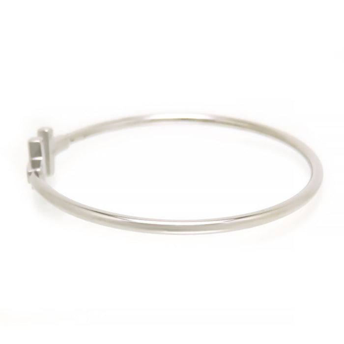 TIFFANY&Co. 
T Wire Diamond Bangle