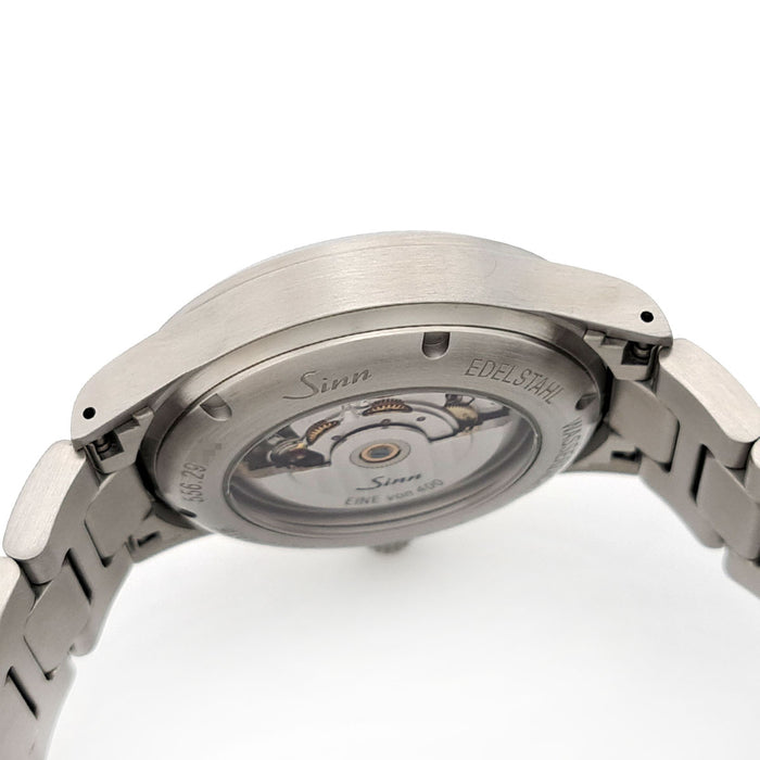 Sinn 
556.EG vert émeraude 
avec boîte et papiers
